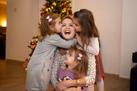 Joyful family moment with laughter and love during the holidaysの写真素材