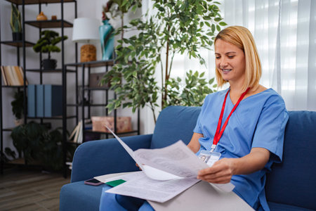 Female Doctor Reviewing Medical Records at Home Office
