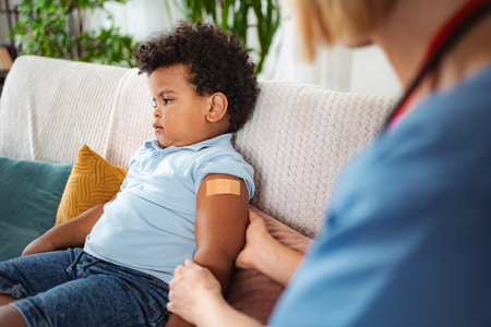 Healthcare professional explaining diagnosis at homeの写真素材