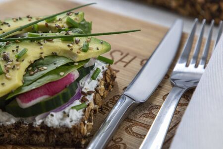Fresh vegetarian sandwich with greens and avocadoの写真素材
