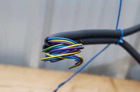 building house electrical wiring in an isolated corrugation