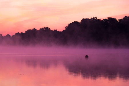 Sunrise over the lakeの写真素材