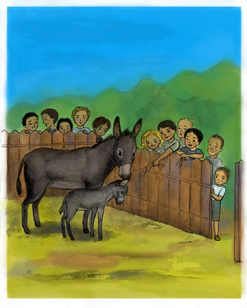 Children came to see the donkey with the coltの写真素材