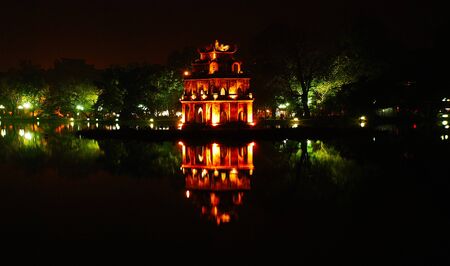 Night Hanoi with the Thap Rua turtle tower in the hanoiの写真素材