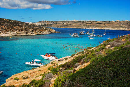Mgdarr port with the ferry to the Comino Islands and city in background