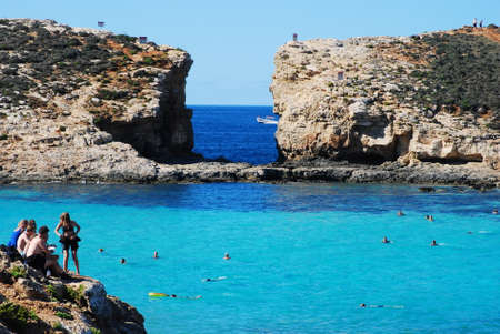 Mgdarr port with the ferry to the Comino Islands and city in backgroundのeditorial素材