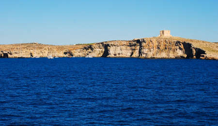 Mgdarr port with the ferry to the Comino Islands and city in backgroundのeditorial素材