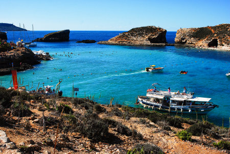 Mgdarr port with the ferry to the Comino Islands and city in backgroundのeditorial素材