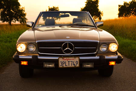 Mercedes Benz R107 380 SL Germany super Veterans front side in sunset countrysideのeditorial素材