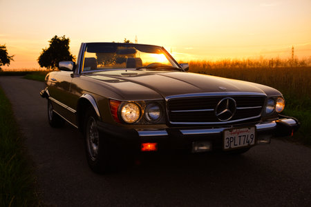 Mercedes Benz R107 380 SL Germany super Veterans front side in sunset countrysideのeditorial素材