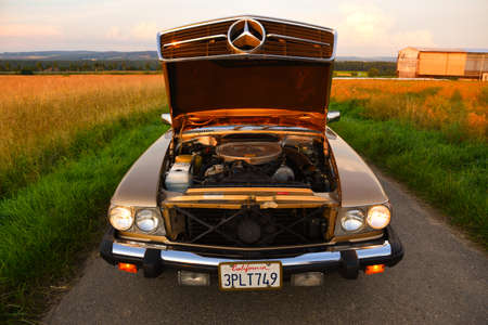 Mercedes Benz R107 380 SL Germany super Veterans front side in sunset countrysideのeditorial素材