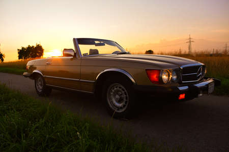 Mercedes Benz R107 380 SL Germany super Veterans front side in sunset countrysideのeditorial素材