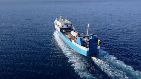 Ro Ro Ship: Aerial view of a medium RoRo Vehicle carrie vessel cruising at sea.の写真素材