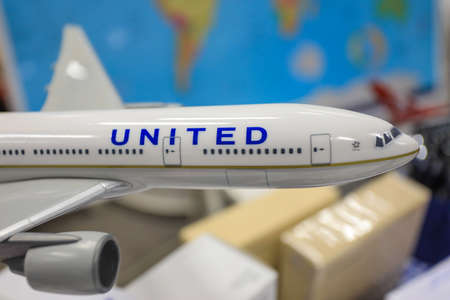 BARCELONA , SPAIN - March 18, 2020: United Airlines mock up aircraft on a world map background.のeditorial素材