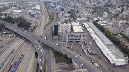 HAIFA, ISRAEL - April 5, 2020: Aerial footage of Haifa downtown area, the wholesale market for vegetables and fruits and the flour station factory.のeditorial素材