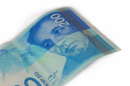200 Israeli Shekels (NIS) bank note isolated on white background.の写真素材