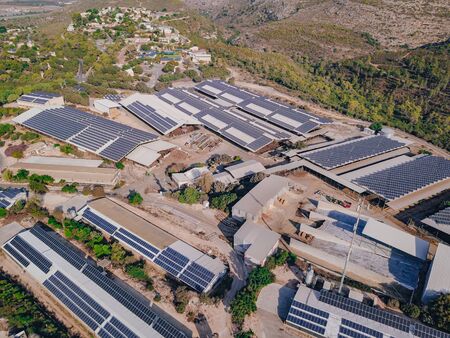 Photovoltaic power plant on a roof. Solar panels on rooftop. 