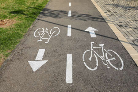 Bicycle path. Bicycle lane sign on a road.