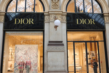 MILAN, ITALY - October 22, 2022: DIOR store. People walk by the DIOR store.のeditorial素材