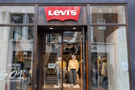 DUBLIN, IRELAND - 25 MARCH 2023: The Exterior of a Levis store with pedestrians passing by outside...