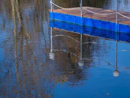 reflections in the water in autumn
