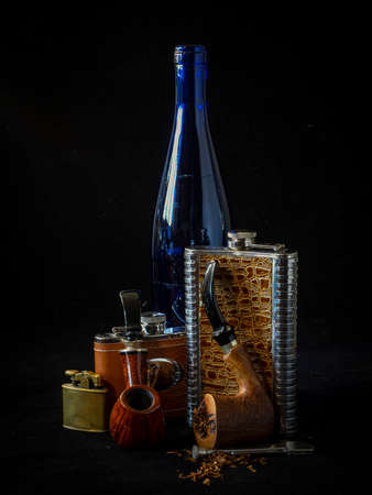 still life with a smoking pipe and tobaccoの写真素材