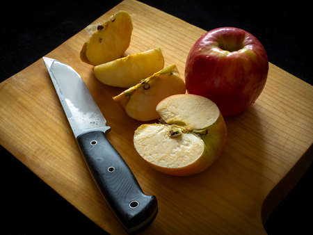 still life with a cut apple and a knifeの写真素材