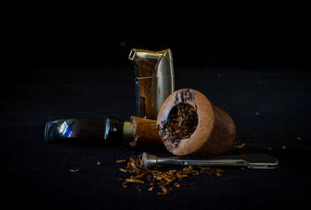 still life with a smoking pipe and tobaccoの写真素材