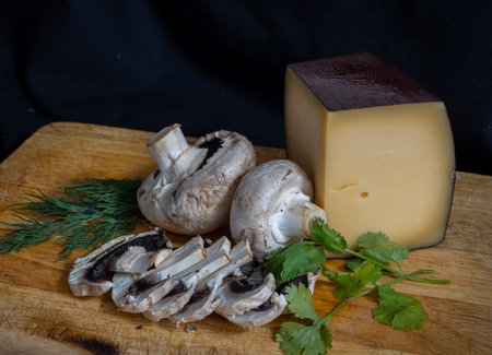 still life with cheese and mushroomsの写真素材