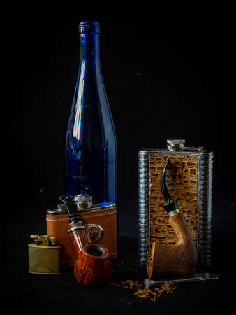 still life with a smoking pipe and tobaccoの写真素材