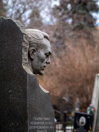 Novodevichy Cemetery in Moscow, monument and grave, sculpture, face in stone, work of artのeditorial素材