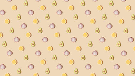 Modern minimalistic pattern arrangement with raw organic lemon, onion and avocado on pastel beige background. Healthy vegan food concept, creative retro flat lay idea.の写真素材