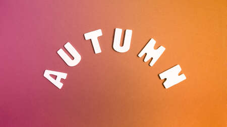 Minimalistic retro concept with white isolated letters on gradient pink and orange background....