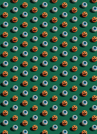 Minimal geometric Halloween idea, pattern holiday season concept, moody dark green background. Spooky horror visualization with eye and carved pumpkin.の写真素材