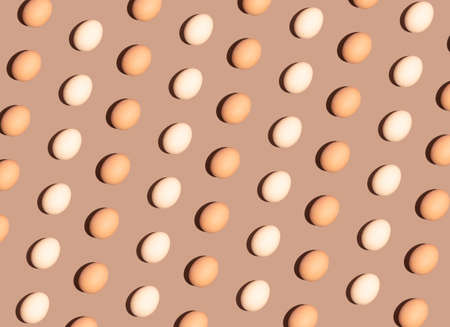 Easter egg pattern idea, spring season and holiday concept. Monochromatic brown background, retro...