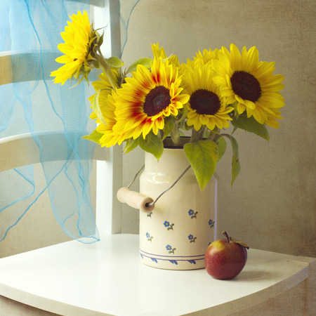 Beautiful  sunflower bouquet with appleの写真素材