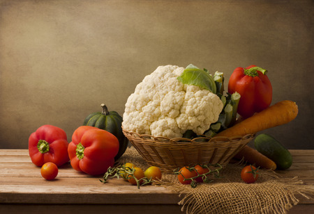 Still life with fresh vegetables on wooden tableの写真素材