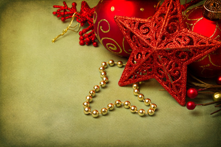 Christmas star ornament on grunge backgroundの写真素材