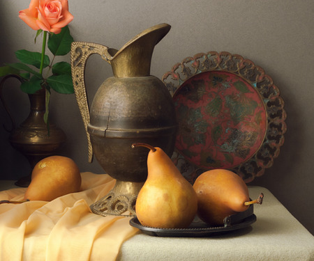 Vintage still life with brown pearsの写真素材