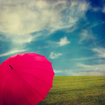 Retro background with pink umbrellaの写真素材
