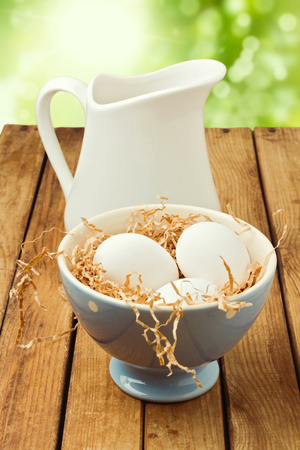 Fresh farmer eggs on wooden tableの写真素材