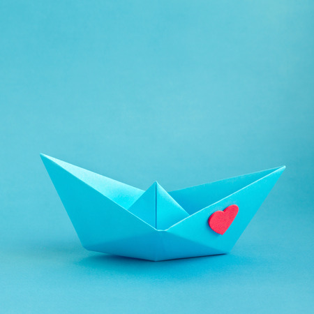 Origami boat with heart. Valentine\'s day greeting cardの写真素材