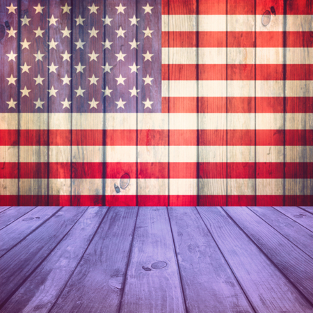 Empty wooden deck table over USA flag backgroundの写真素材
