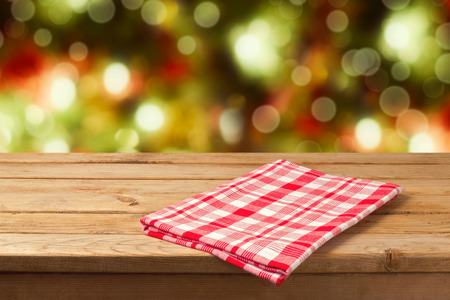 Christmas empty wooden table with tablecloth for product montage displayの写真素材