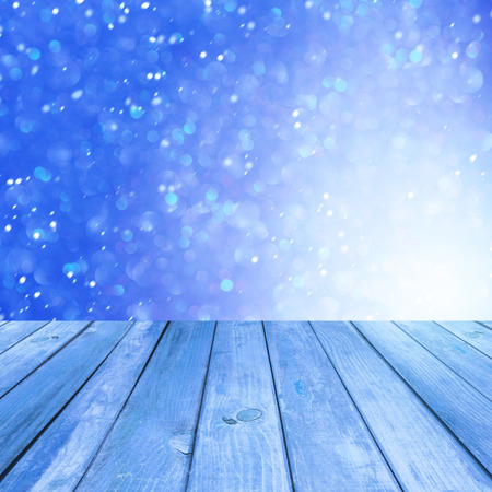Winter background with empty wooden deckの写真素材