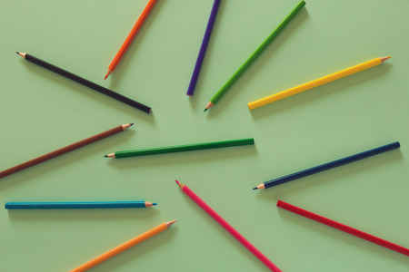 Abstract background with bunch of color pencils. View from aboveの写真素材