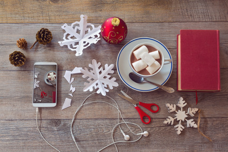 Christmas holiday celebration items for Preparing paper snowflakes. View from above.の写真素材