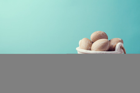 Easter holiday eggs decoration on wooden tableの写真素材