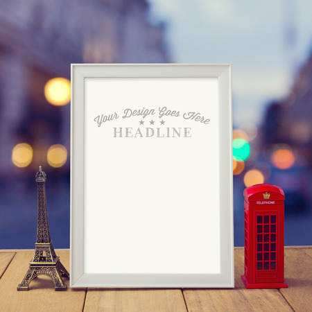 Poster mock up template with Eiffel Tower and London phone booth over city bokeh backgroundの写真素材