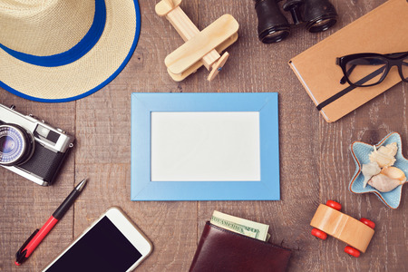 Travel and vacation concept background with blank frame and objects. View from aboveの写真素材